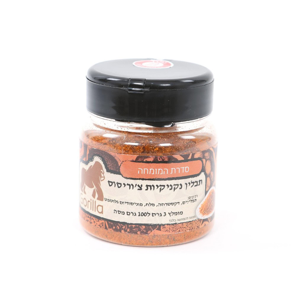 צנצנת של תערובת תבלינים לברביקיו בטעם הדרים של המותג "גורילה", עם מכסה שחור וכיתוב בעברית על התווית. צנצנת של תערובת תבלינים לברביקיו בטעם הדרים של המותג "גורילה", עם מכסה שחור וכיתוב בעברית על התווית.